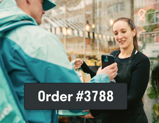 2. Staff confirm the order number and hand it over
